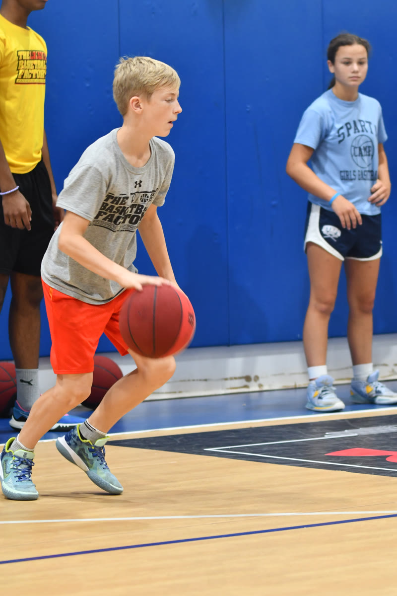 Kids playing basketball at TBF summer camp Sussex County