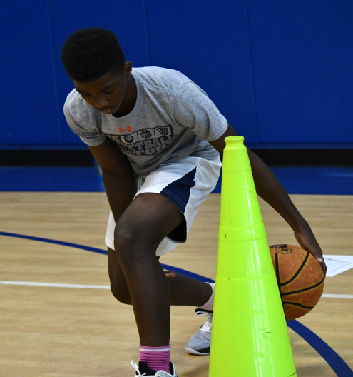 Ball handling drills at TBF youth skills camp