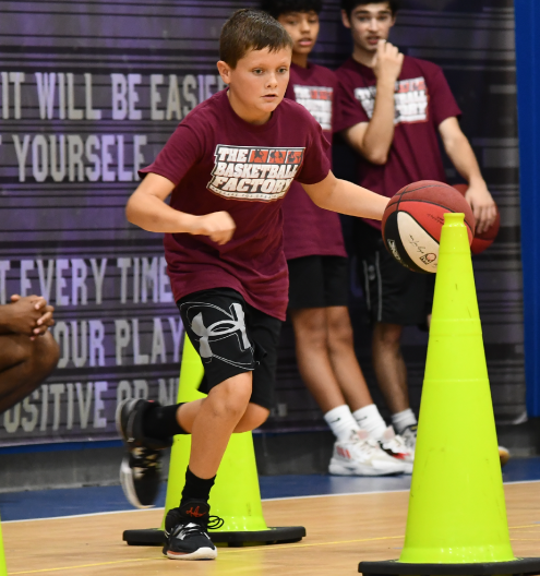 Young player working on dribble moves at TBF